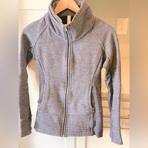 Lululemon zip front jacket. Grey with a high neck. Size 2